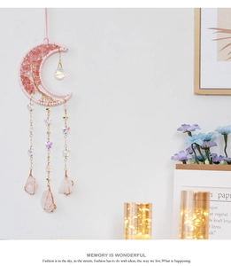 Detail of life tree dream catcher with pink crystal stones and moon frame decoration
