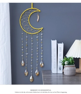 Moon shaped dreamcatcher with yellow crescent frame and natural raw crystal stones pendant