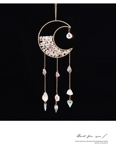 Detailed moon-shaped suncatcher with purple stones and faceted crystal prisms