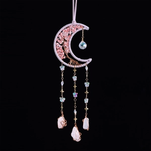 Pink moon tree of life dream catcher with colorful feathers and natural white crystals