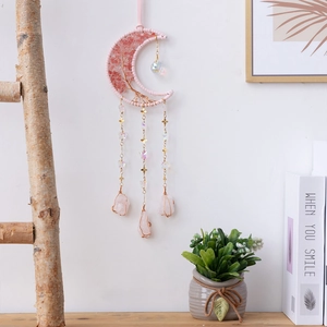 Pink moon-shaped dreamcatcher with life tree crystals and feathers for wall decoration