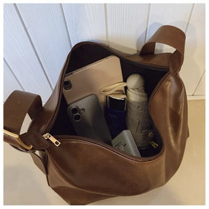 Deep coffee tote bag interior showing large capacity for tablet and daily items