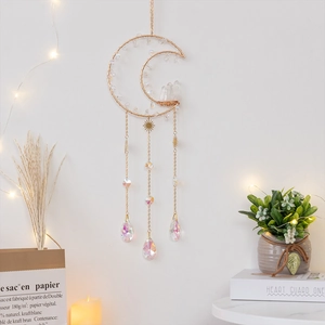 Bohemian gold crescent moon suncatcher with crystal clusters and colorful hanging pendants