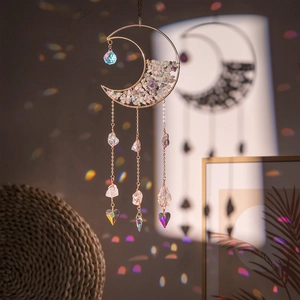 Golden moon suncatcher with purple crystals and hanging rainbow prisms for garden decor