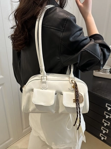 Chic white faux leather underarm bag with decorative charms for women's 2025 fashion