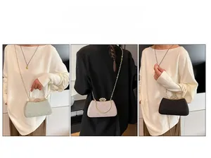 Three sparkly evening clutch bags with round metal handles and chain straps in various colors