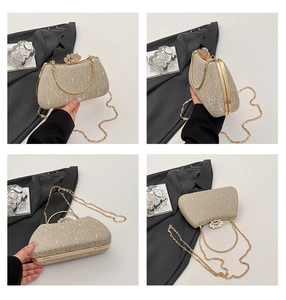 Detail view of champagne lace evening clutch with diamond clasp and metal round handle