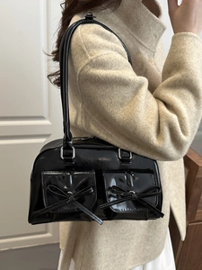 Black glossy PU patent leather ballet style hobo bag with cute bow detail and pockets