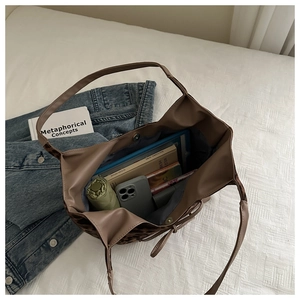 Detailed interior of a leopard print tote bag showing large capacity for daily essentials