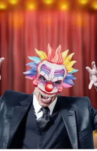 Detailed view of scary clown cosplay mask featuring colorful hair and sharp fangs