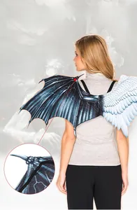 Detail of angel and demon cosplay wings showing white feathers and black bat wing texture