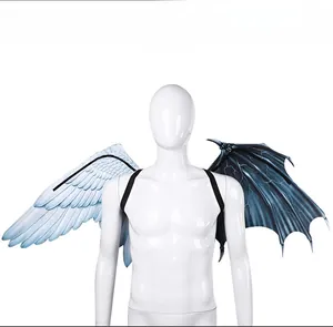 Detail of angel and demon wings with white feathers and black faux leather texture