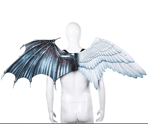 Detail view of large bicolor devil and angel wings with adjustable straps for cosplay