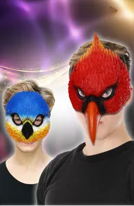 Detail of red and blue simulation bird masks with feather texture for cosplay and prom party