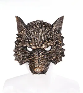 Detail of bronze wolf mask showing realistic hair texture and sharp wolf ears