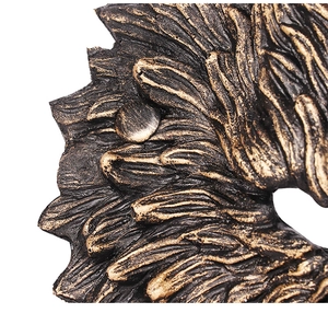 Detailed close-up showing the textured faux fur and gold paint finish on wolf mask