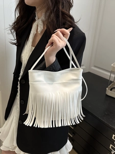 Minimalist white PU leather handbag with elegant fringe tassels and slim dual handles