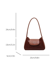 Brown crocodile embossed shoulder bag with metal bow detail and size dimensions