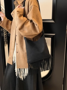 Bohemian black shoulder bag with long tassels and premium matte texture for women