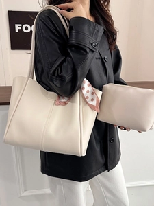 Minimalist beige leather tote bag with polka dot scarf and matching pouch set