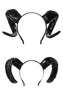Détails de serre-têtes cornes noires montrant des textures lisses et en spirale de fête