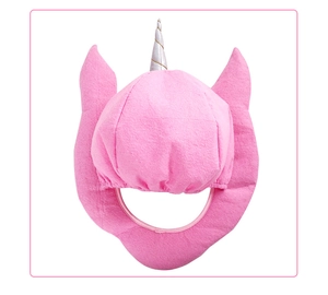 Detailed view of pink unicorn headgear with silver spiral horn and soft plush fabric