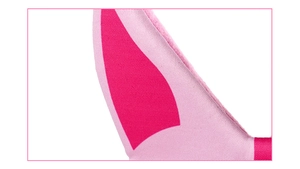 Detailed macro view of pink fabric unicorn ear featuring magenta stitched inner lining