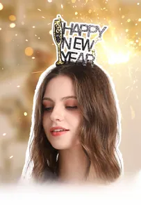 Detail of Happy New Year headband featuring gold and silver glitter and champagne motifs