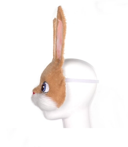 Side view of plush brown rabbit mask with long ears and elastic band on a white model