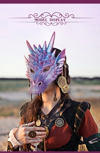 Detail shot of the pearlescent blue dragon mask featuring intricate scale textures