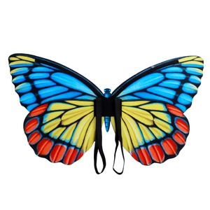 Detailed view of colorful butterfly wing cape with vibrant blue and yellow prints