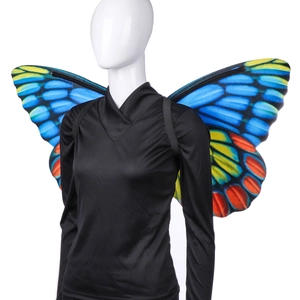Detailed view of colorful butterfly wings with vibrant blue, yellow, and orange gradients