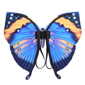 Detail of royal blue butterfly wings featuring elastic straps and vivid prints