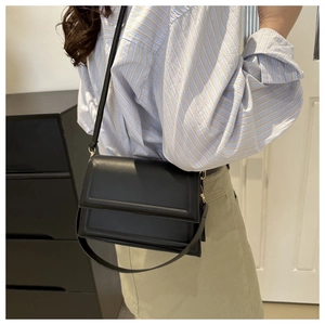 Minimalist black PU leather rectangular crossbody bag with thin strap for daily wear