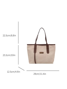 Beige canvas tote bag with brown leather trim and detailed size measurements