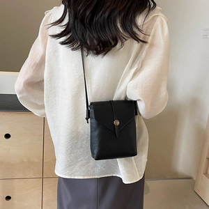 Minimalist black pebble leather mobile phone crossbody bag with gold round metal buckle