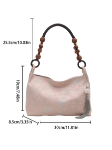 Pink jacquard underarm bag with wooden ring handles and floral tassel charm dimensions