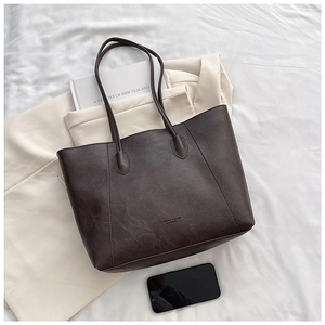 Deep brown retro faux leather tote bag with long straps and gold text detail