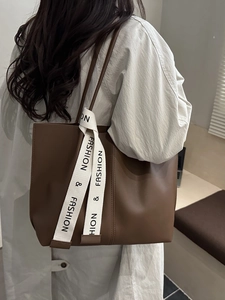 Classic vintage brown leather tote bag for women with fashion branded ribbon shoulder strap