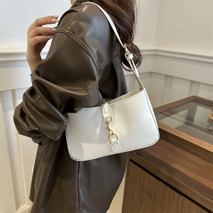 Chic white faux leather shoulder bag with gold metal clasp for modern women