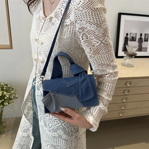 Chic patchwork denim handbag with knot handle and leather strap for women 2024