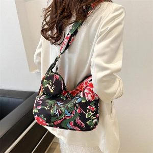 Ethnic floral and dragon print black hobo bag with round coin purse and wide strap