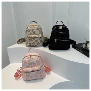 Mini floral embroidered backpacks in apricot black and pink with gold zippers