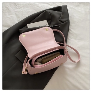 Pink PU leather crossbody bag interior showing spacious storage for phone and wallet