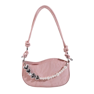 Pink pleated leather underarm bag with decorative pearl and silver heart chain