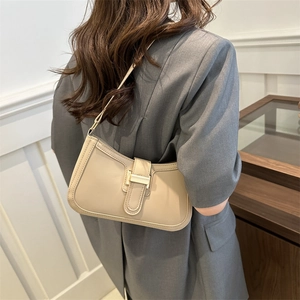 Retro beige crescent baguette bag with golden buckle and leather strap for women