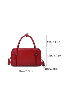 Red minimalist faux leather handbag with embossed fashion logo and size dimensions
