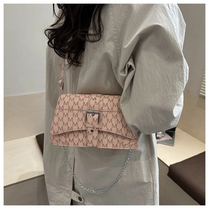 Close-up of pink M-letter print crossbody bag with silver chain and metal buckle detail