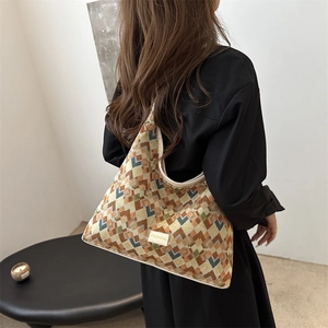 Chic geometric jacquard tote bag with earth-tone patterns for stylish daily commuting