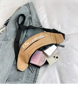 Detail showing internal storage capacity of the khaki nylon waist bag with accessories